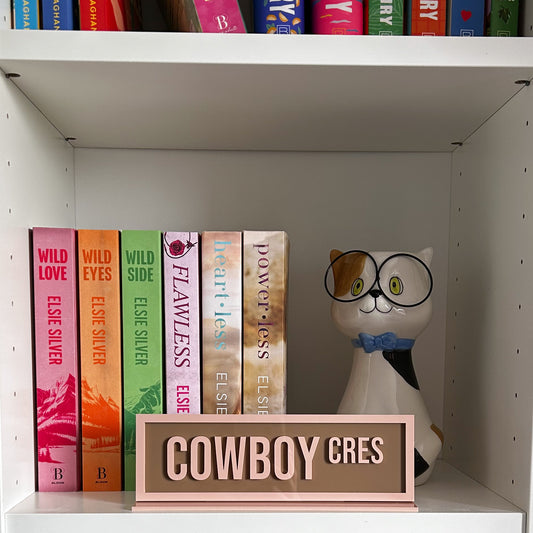 Cowboy Cres Street Sign